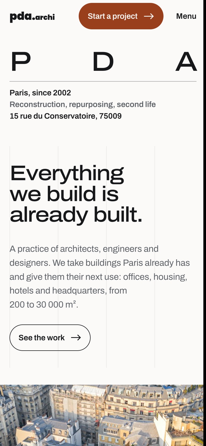 The redesigned home page on a phone: wordmark, a Menu button, the claim and a call to action above the photograph.
