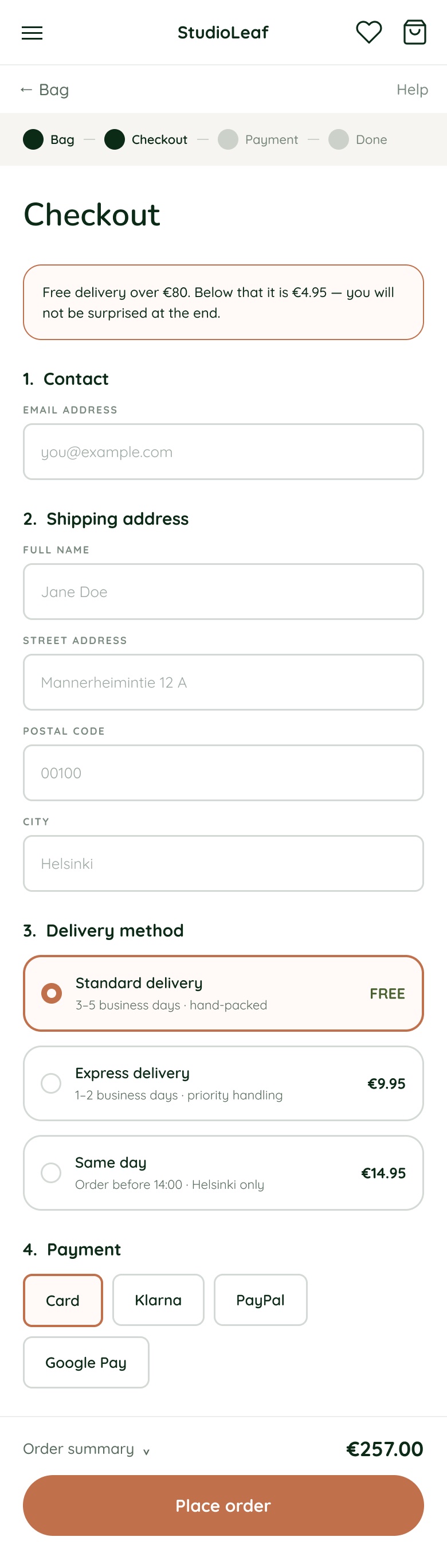 Mobile checkout with the delivery cost stated above the first form field.
